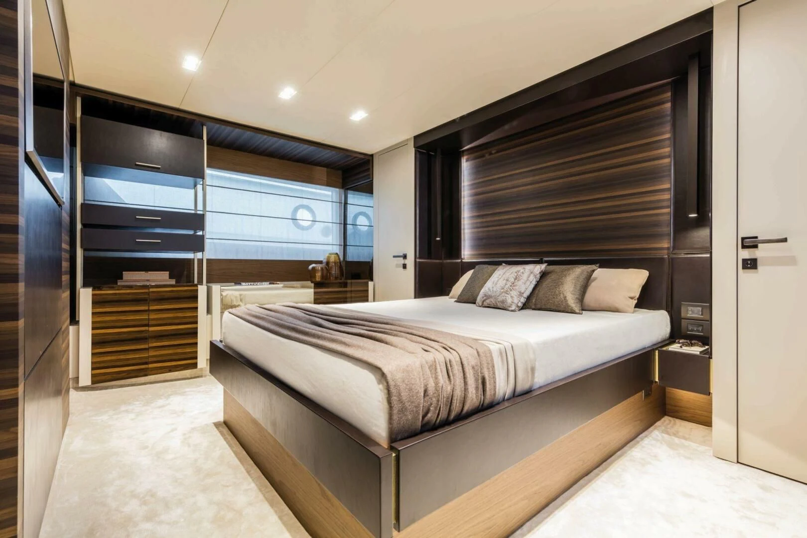 a large bedroom with a large bed aboard OUR TRADE Yacht for Sale
