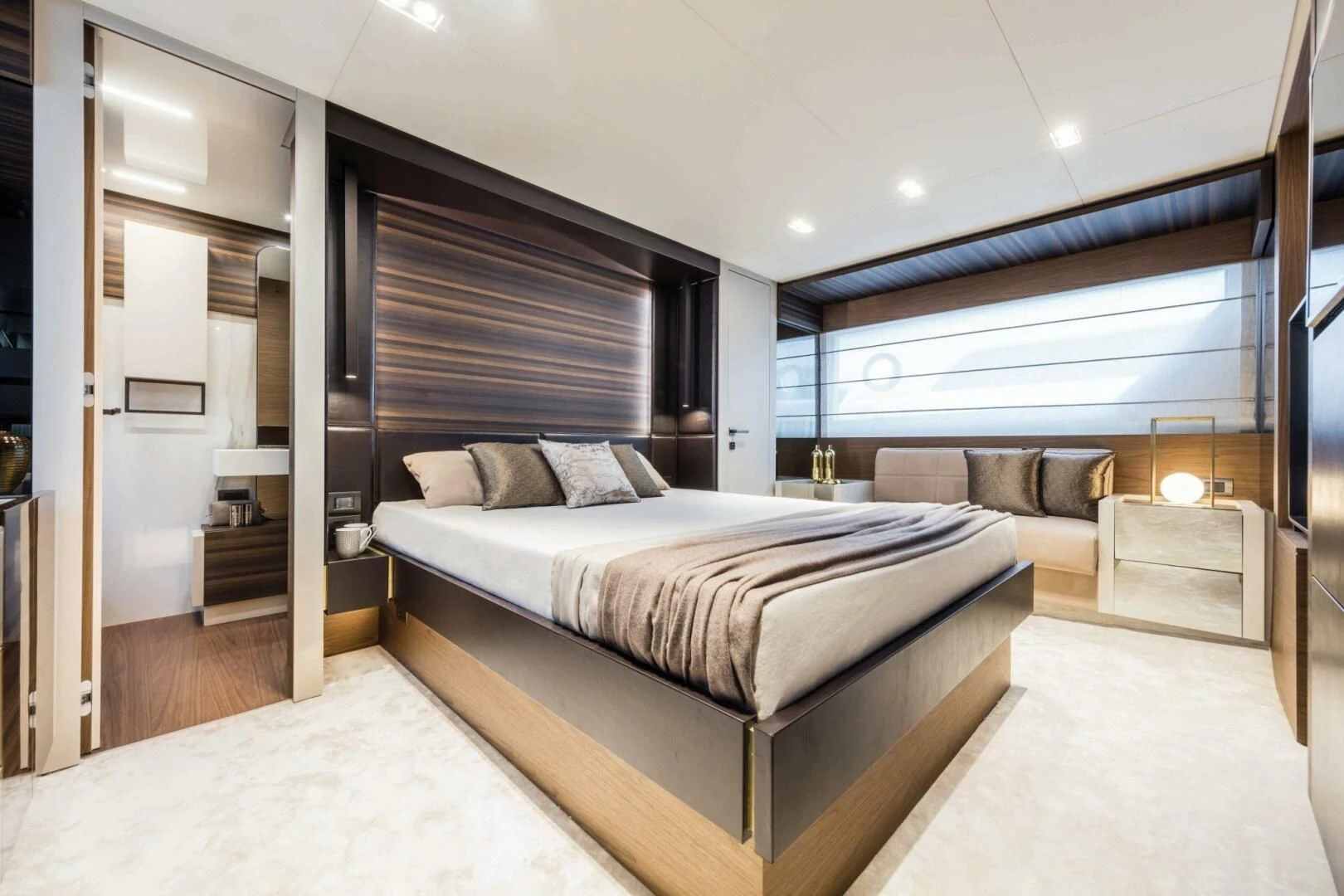 a large bedroom with a bed aboard OUR TRADE Yacht for Sale