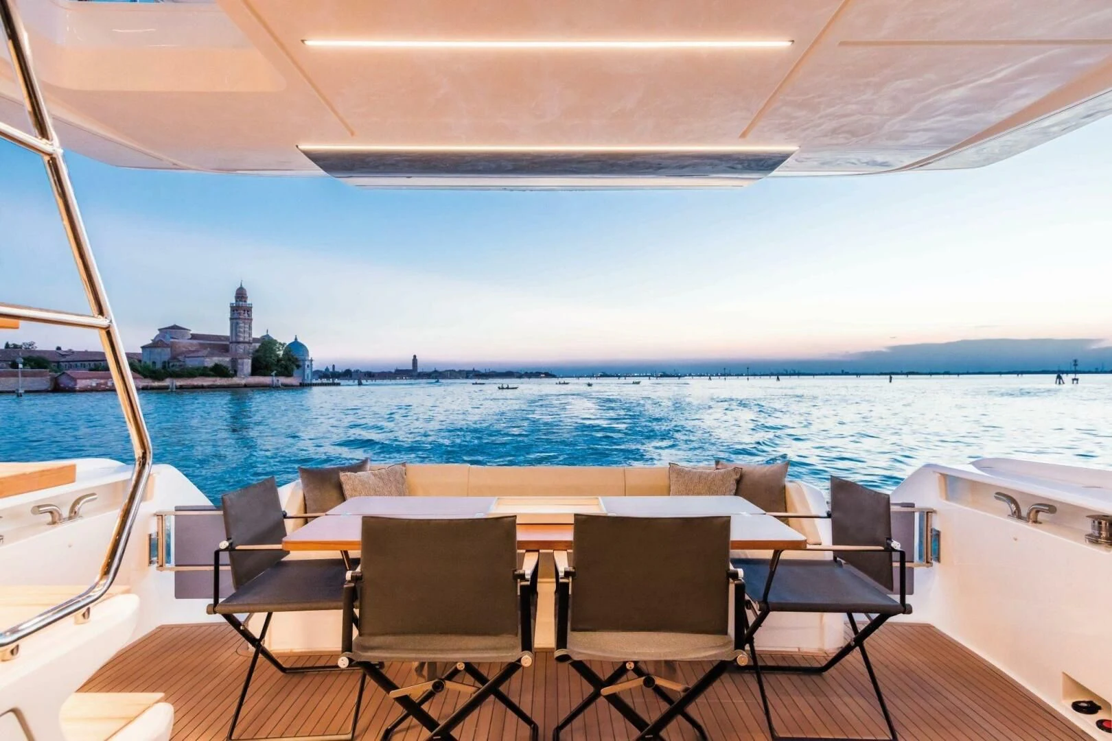 a room with a table and chairs aboard OUR TRADE Yacht for Sale