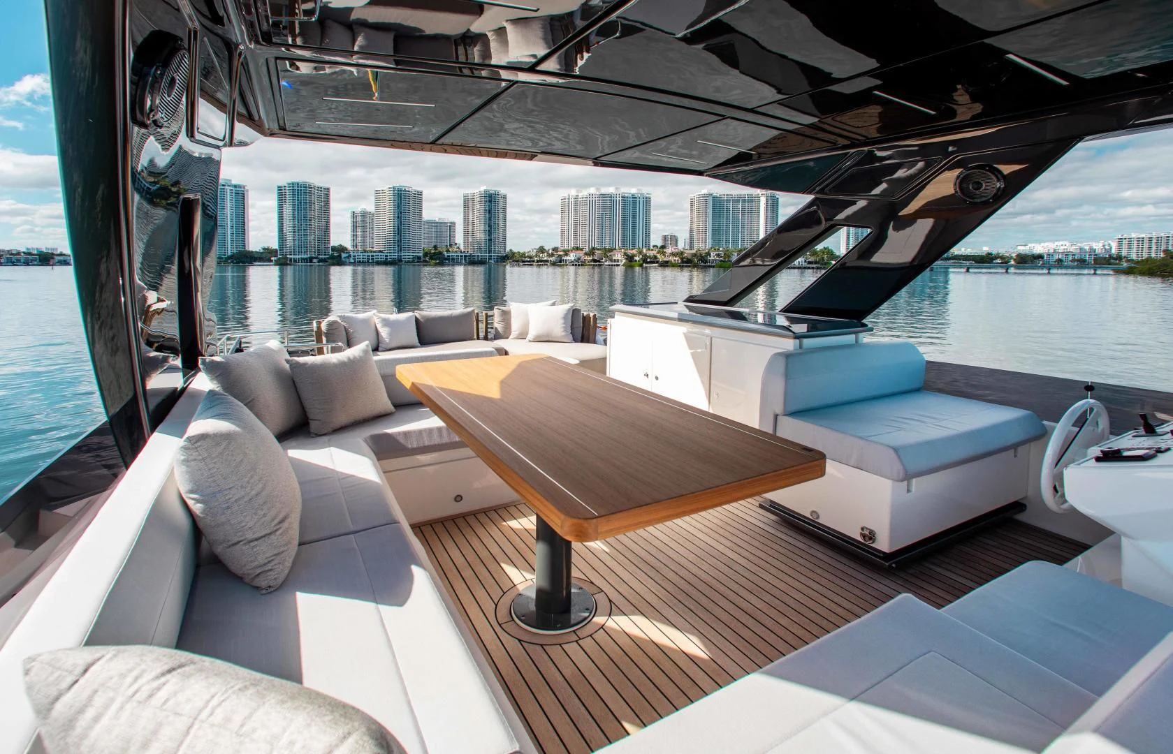 a room with a view of a city aboard OUR TRADE Yacht for Sale