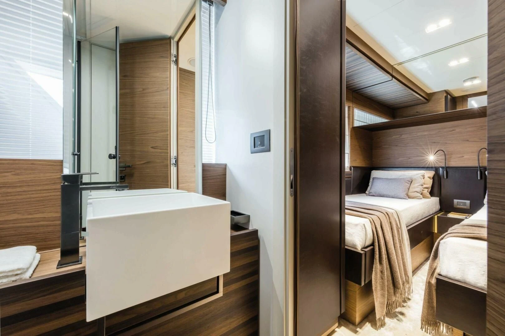 a room with a bed and a mirror aboard OUR TRADE Yacht for Sale