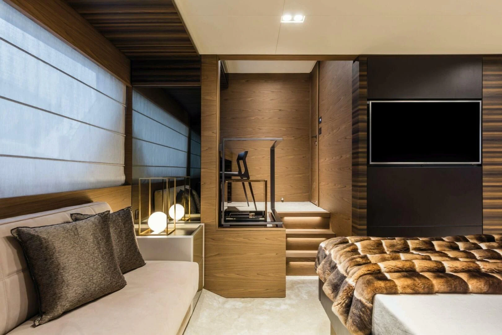 a room with a fireplace aboard OUR TRADE Yacht for Sale