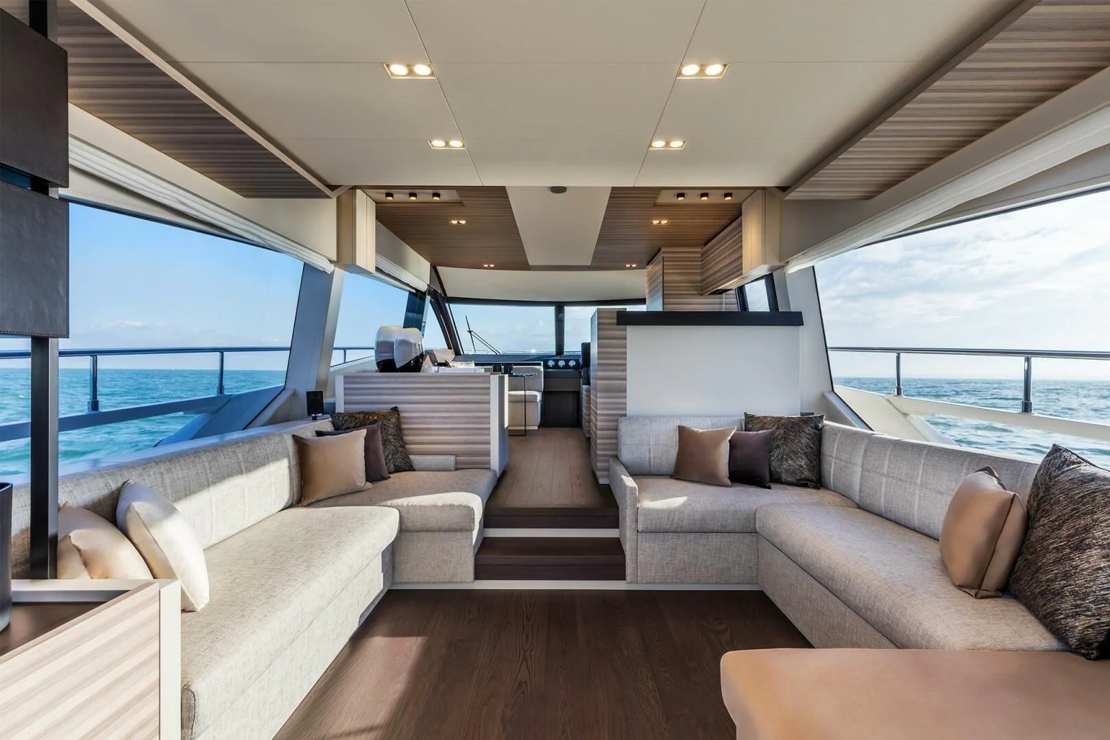 a living room with a large window aboard OUR TRADE Yacht for Sale