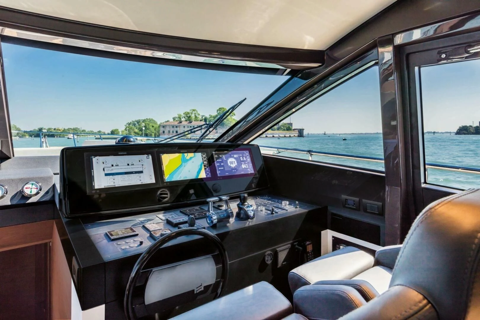 inside of a car aboard OUR TRADE Yacht for Sale