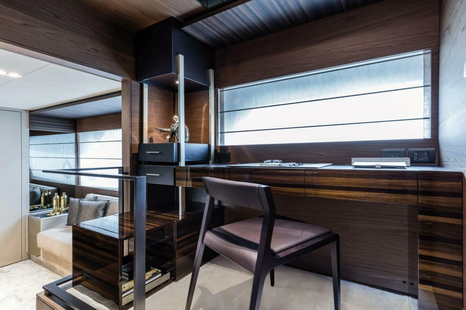a room with a chair and a desk aboard OUR TRADE Yacht for Sale