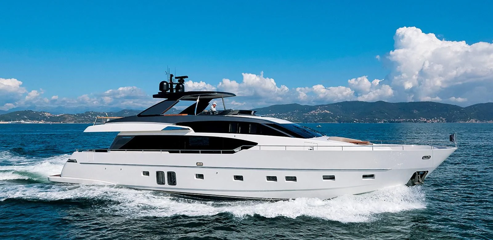 a white yacht on the water aboard SANLORENZO SX88/01 Yacht for Sale