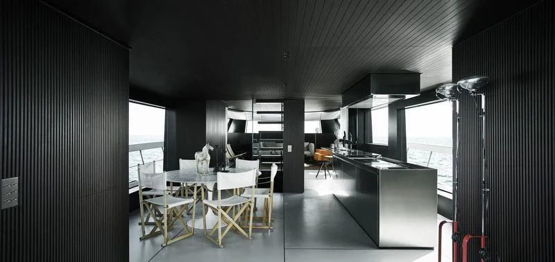 a room with a table and chairs aboard SANLORENZO SX88/01 Yacht for Sale