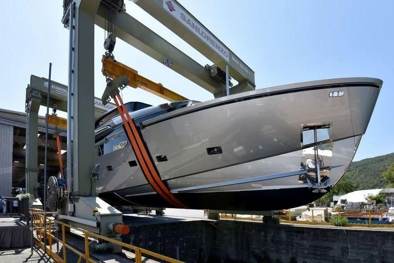 a large metal object with a red stripe on it aboard SANLORENZO SX88/01 Yacht for Sale
