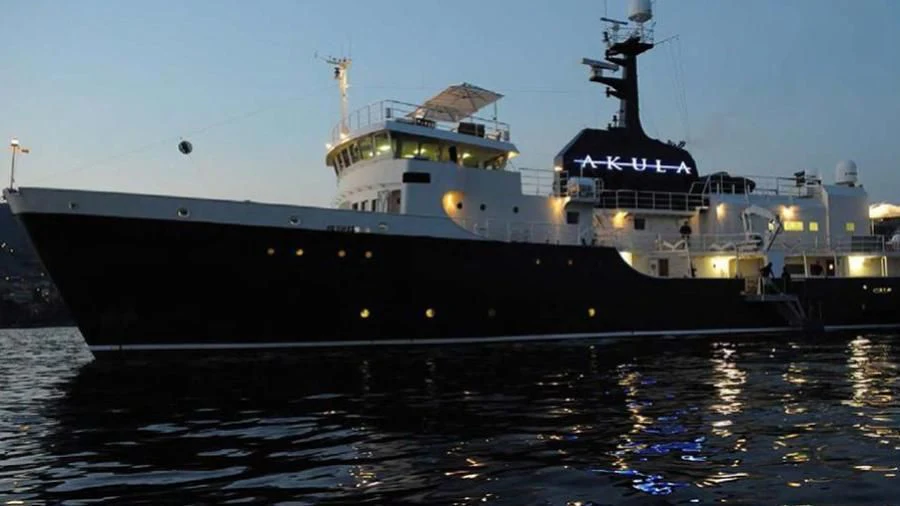 a large ship on the water aboard OMNIA Yacht for Sale
