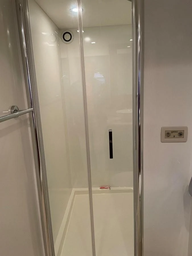 a shower with a glass door aboard GRACE ELLEN Yacht for Sale