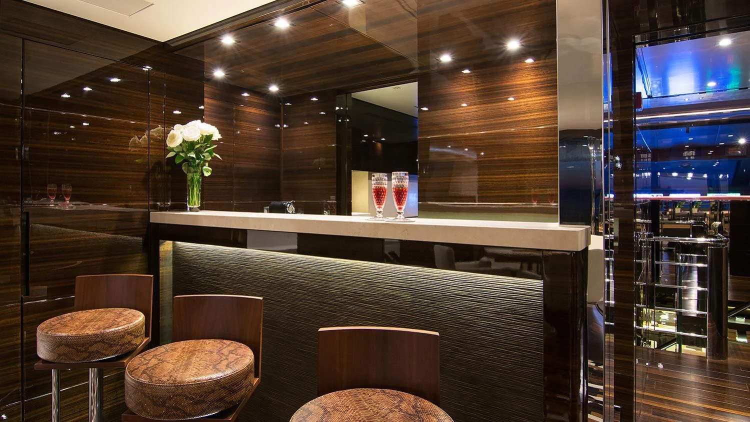 a bar with a table and chairs aboard SOURAYA Yacht for Sale
