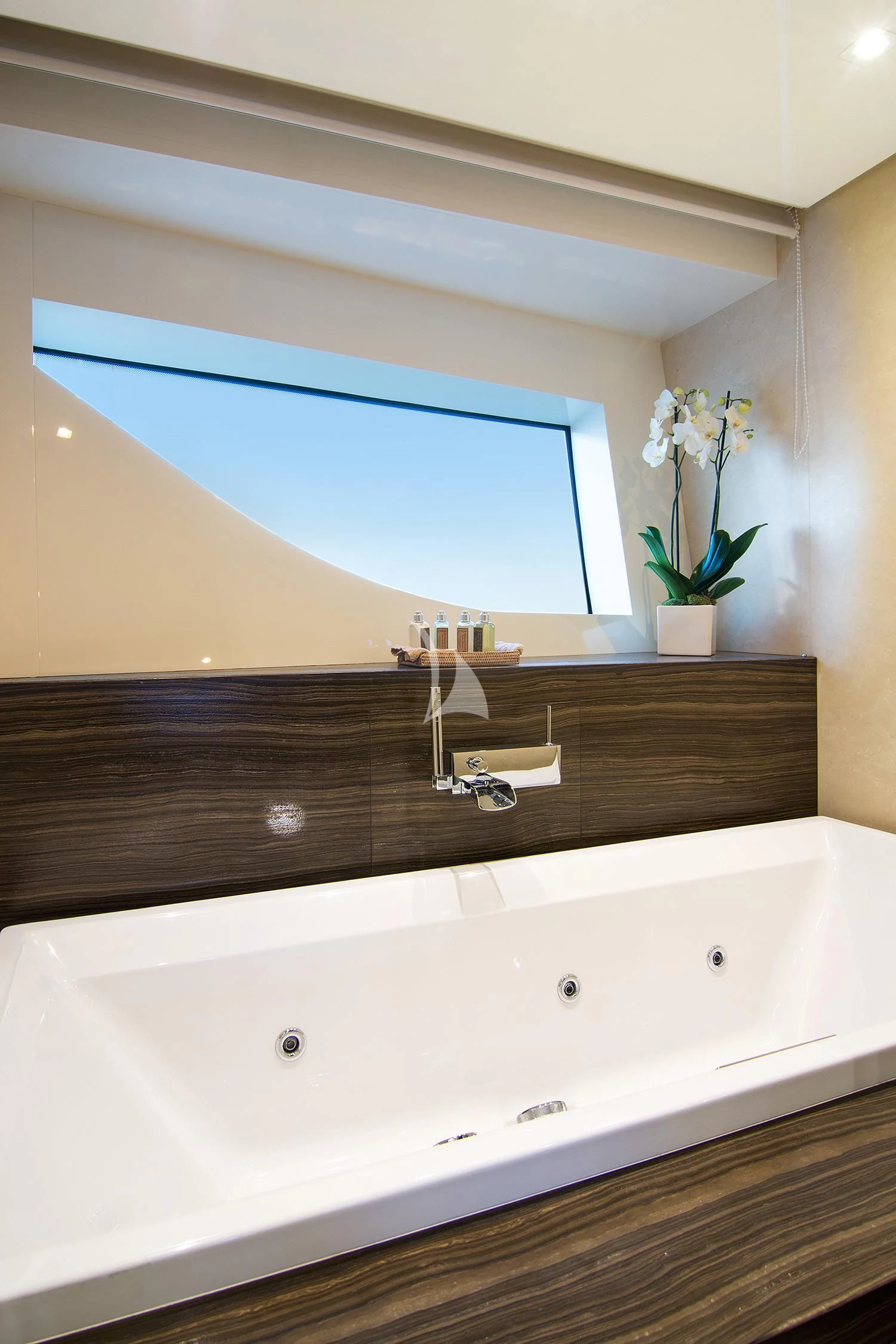 a bathroom with a large bathtub aboard SOURAYA Yacht for Sale