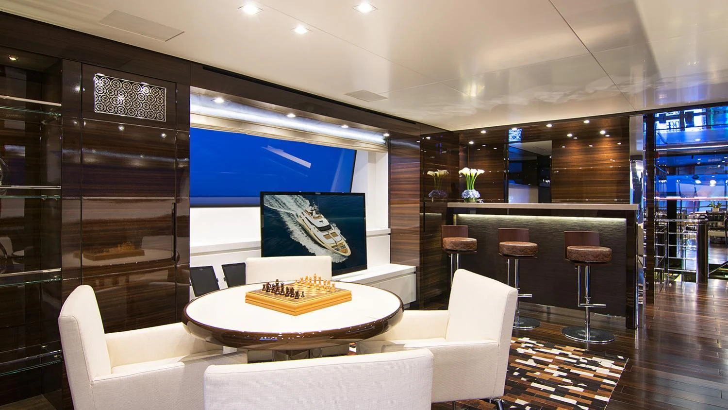 a room with a table and chairs aboard SOURAYA Yacht for Sale