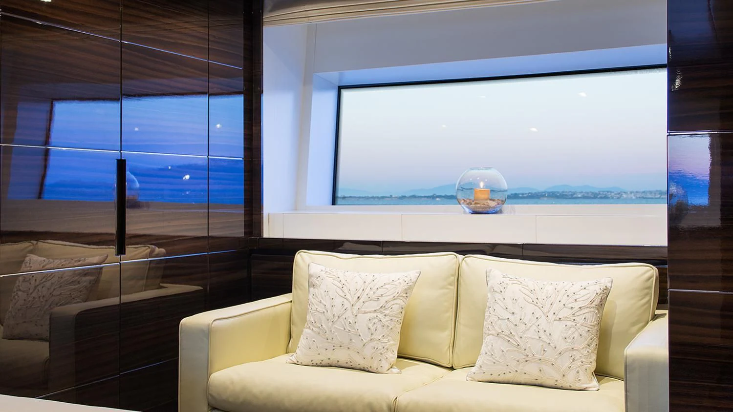 a room with a couch and a television aboard SOURAYA Yacht for Sale