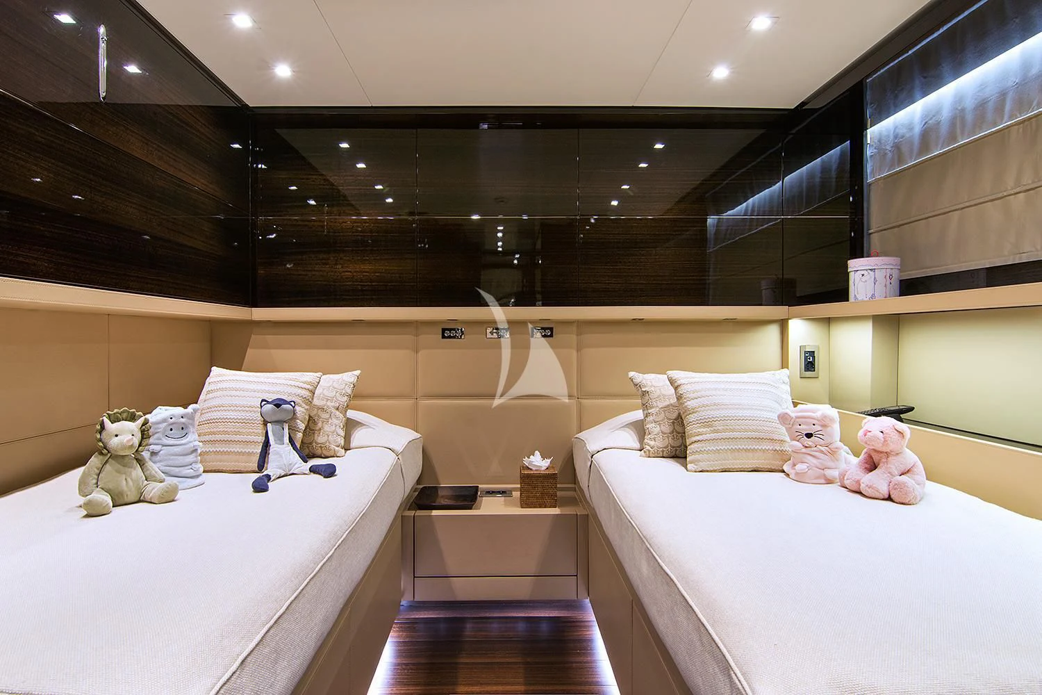a room with a bed and stuffed animals aboard SOURAYA Yacht for Sale