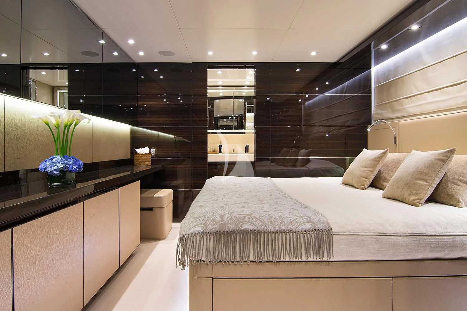 a modern bedroom with a bed aboard SOURAYA Yacht for Sale