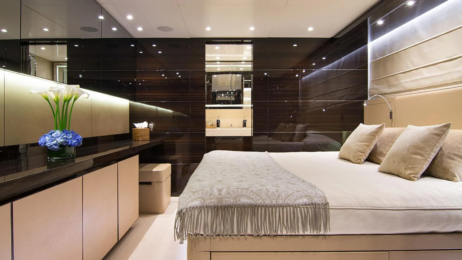 a room with a bed and a desk aboard SOURAYA Yacht for Sale