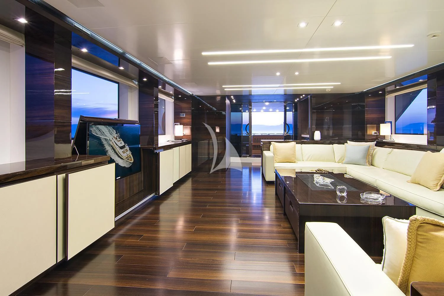 a room with a table and chairs aboard SOURAYA Yacht for Sale