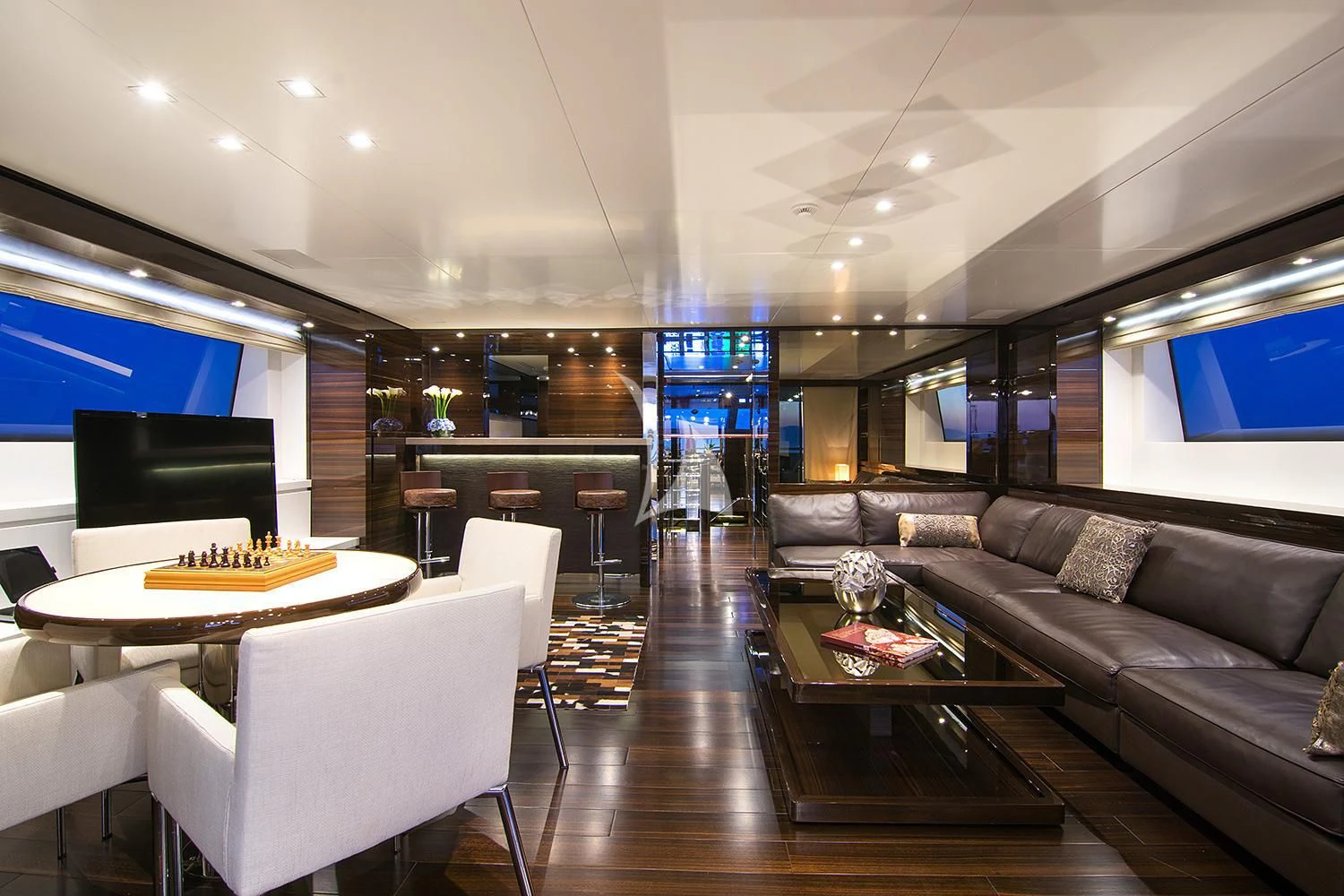 a living room with a couch and a table aboard SOURAYA Yacht for Sale