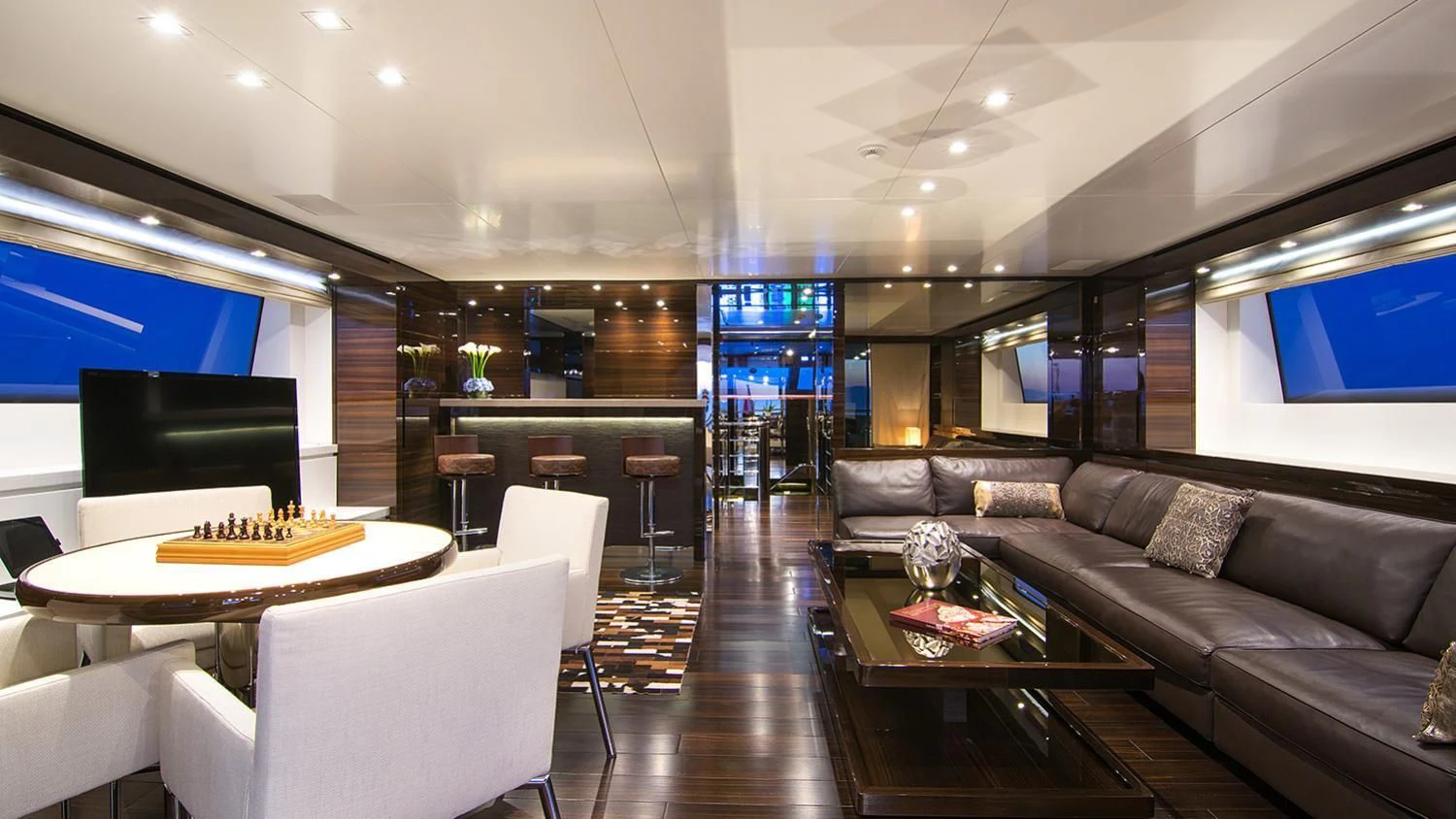 a living room with a large sofa aboard SOURAYA Yacht for Sale