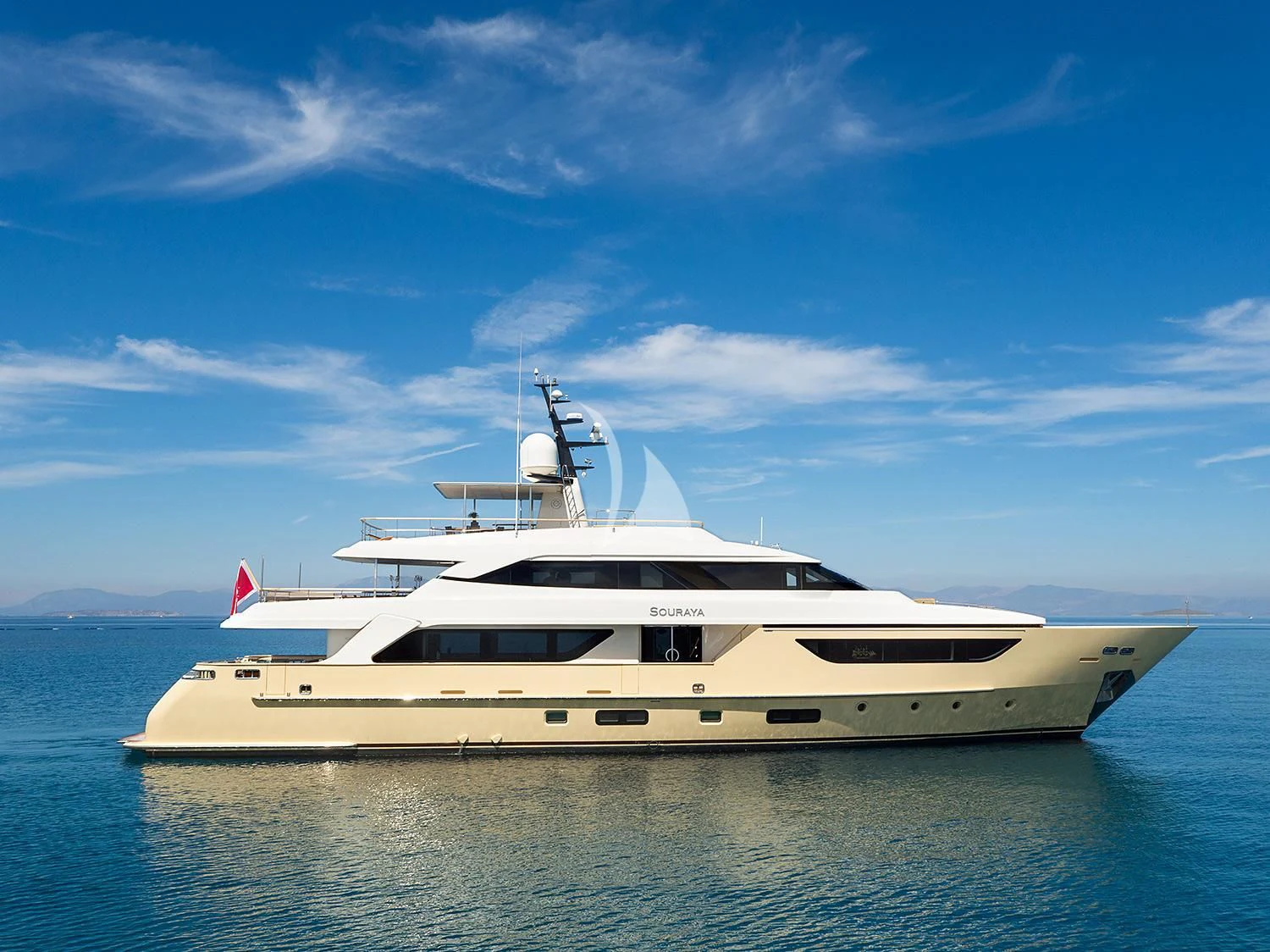 a white yacht in the water aboard SOURAYA Yacht for Sale