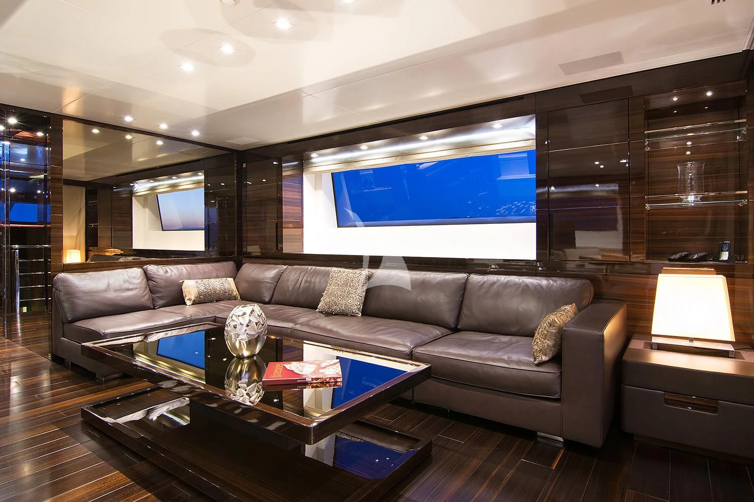a living room with a large screen aboard SOURAYA Yacht for Sale