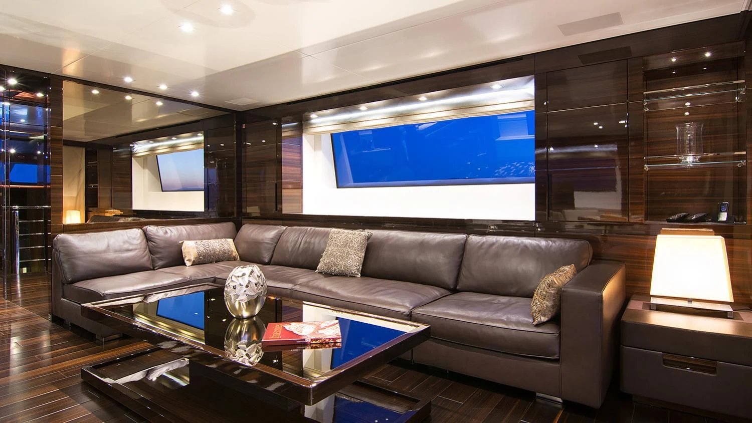 a living room with a large screen aboard SOURAYA Yacht for Sale