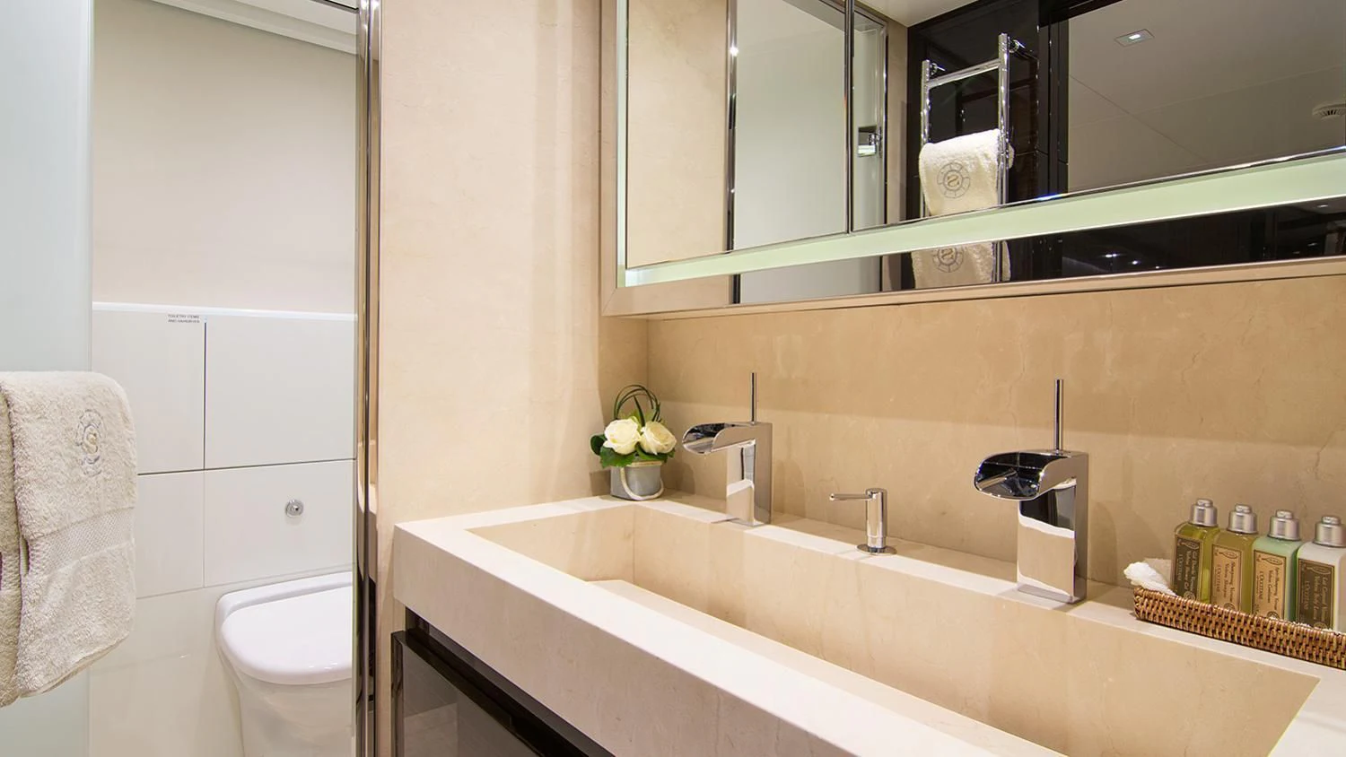 a bathroom with a mirror and a sink aboard SOURAYA Yacht for Sale