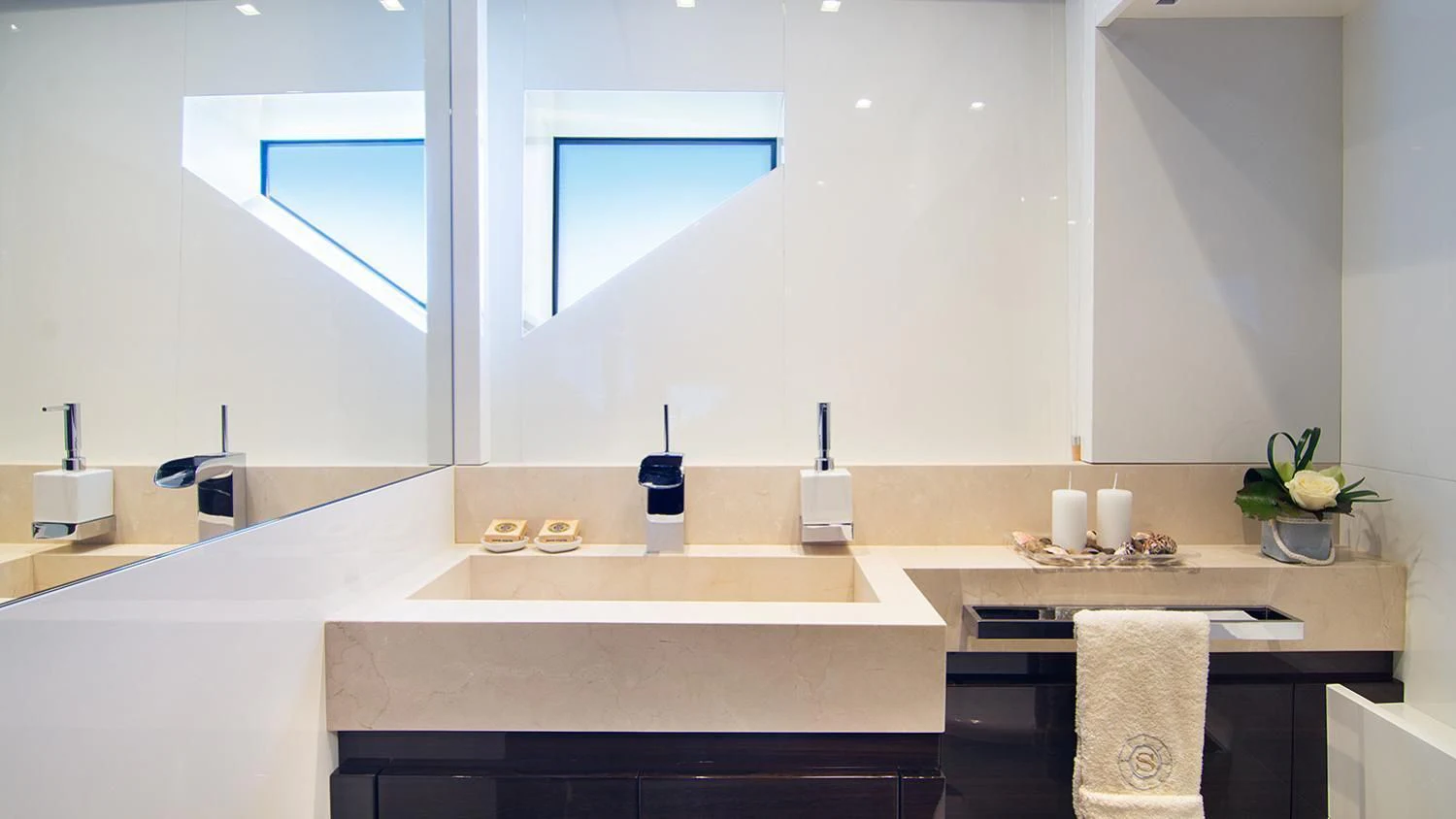 a bathroom with a large mirror aboard SOURAYA Yacht for Sale
