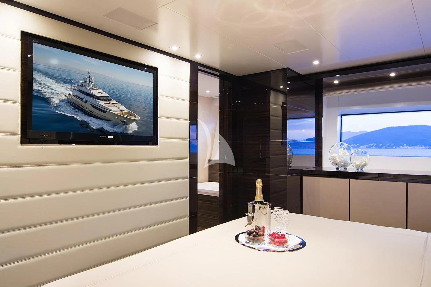 a tv on a wall aboard SOURAYA Yacht for Sale