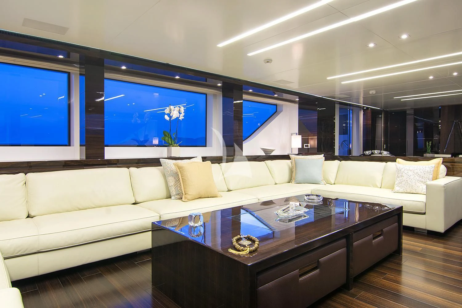 a living room with a large screen aboard SOURAYA Yacht for Sale