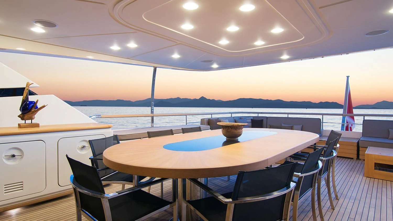 a room with a table and chairs aboard SOURAYA Yacht for Sale
