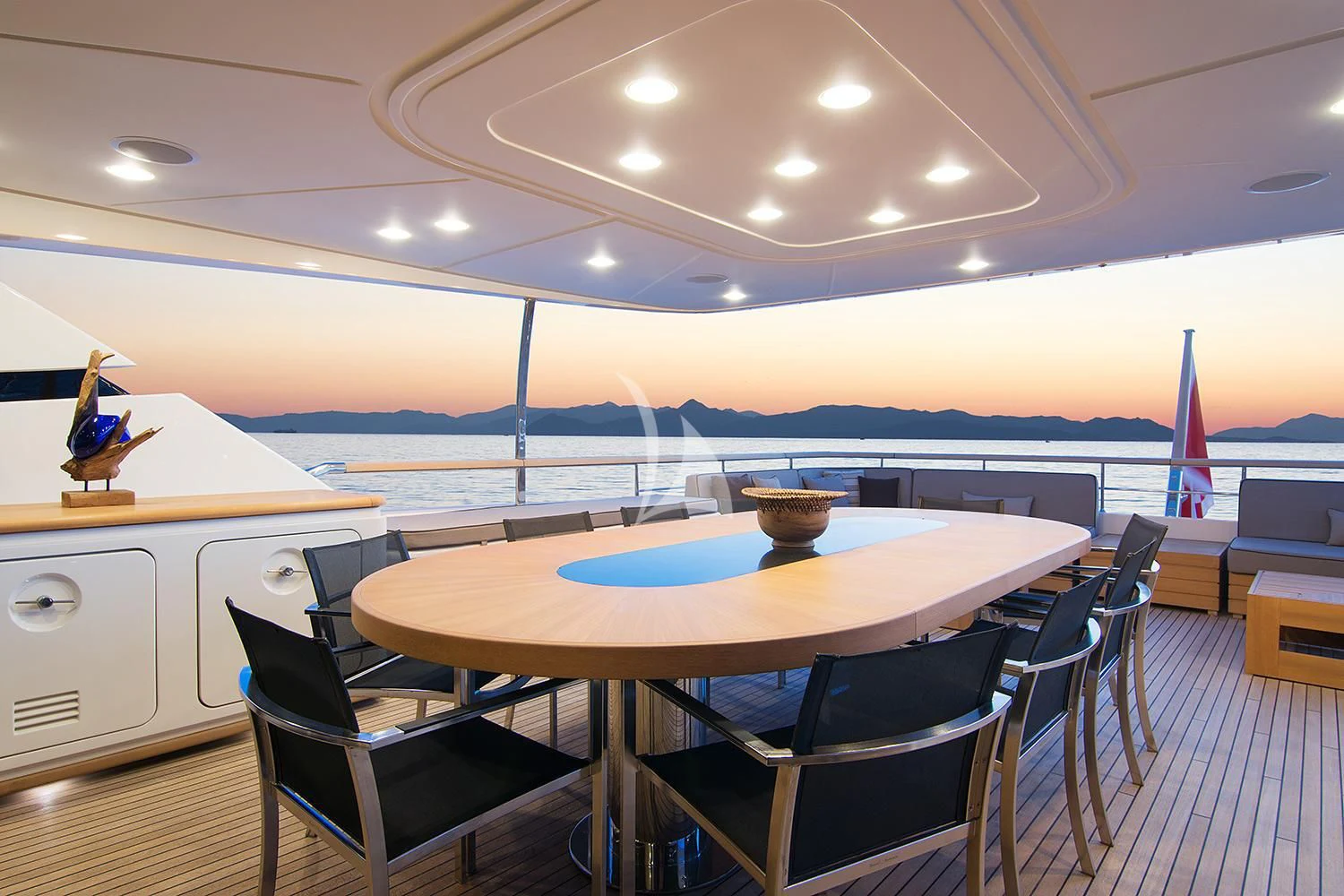 a room with a table and chairs aboard SOURAYA Yacht for Sale