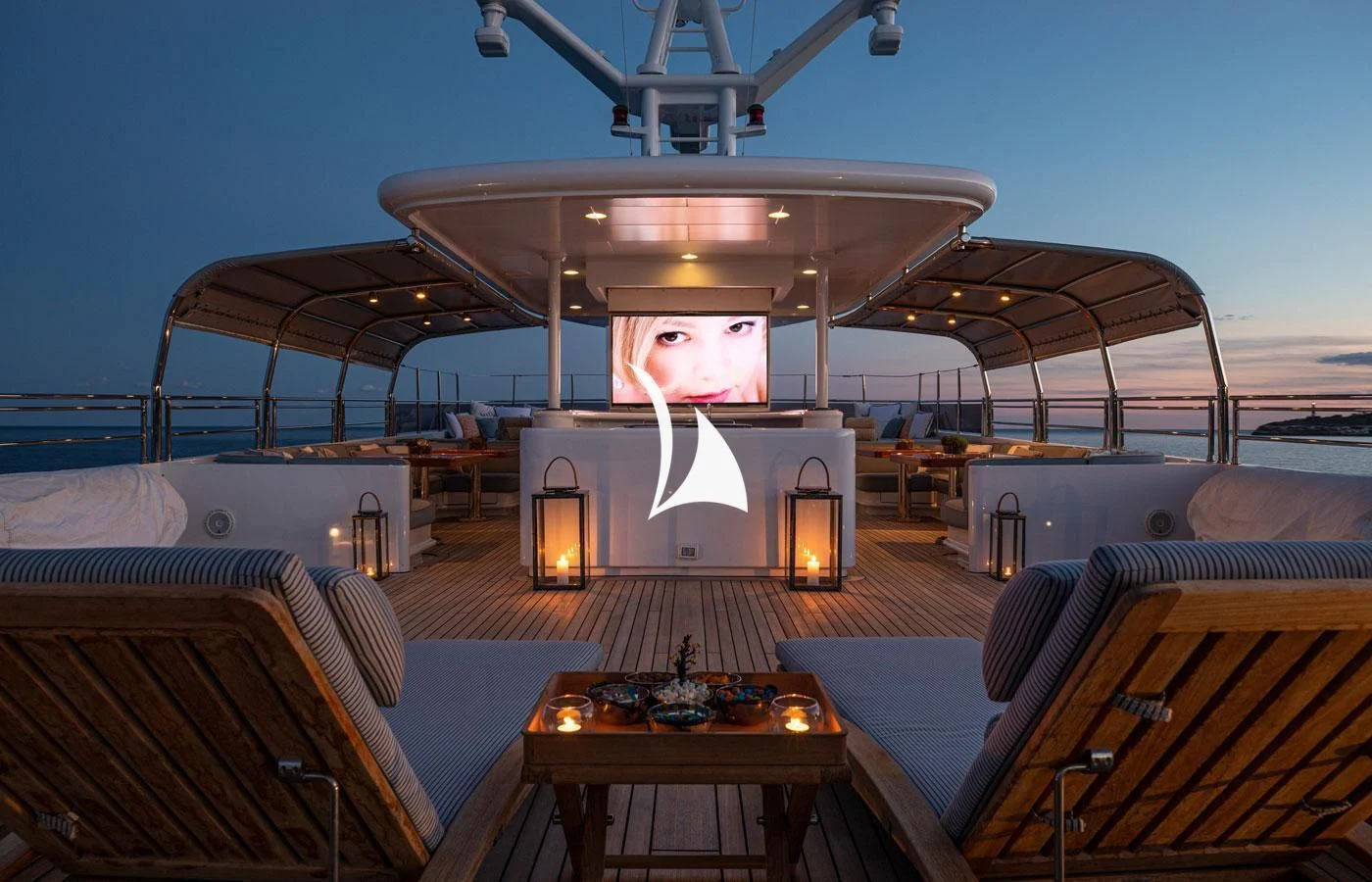 a boat with a large screen aboard EMERALD (YET) Yacht for Sale