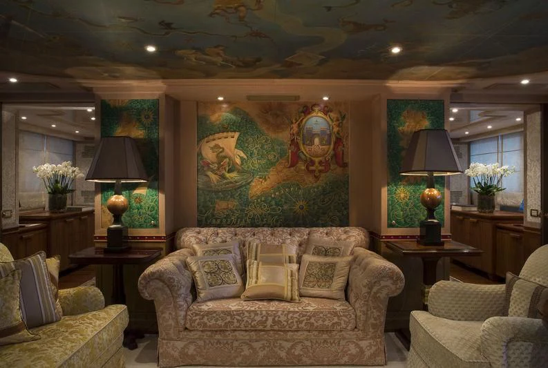a living room with a large painting aboard EMERALD (YET) Yacht for Sale