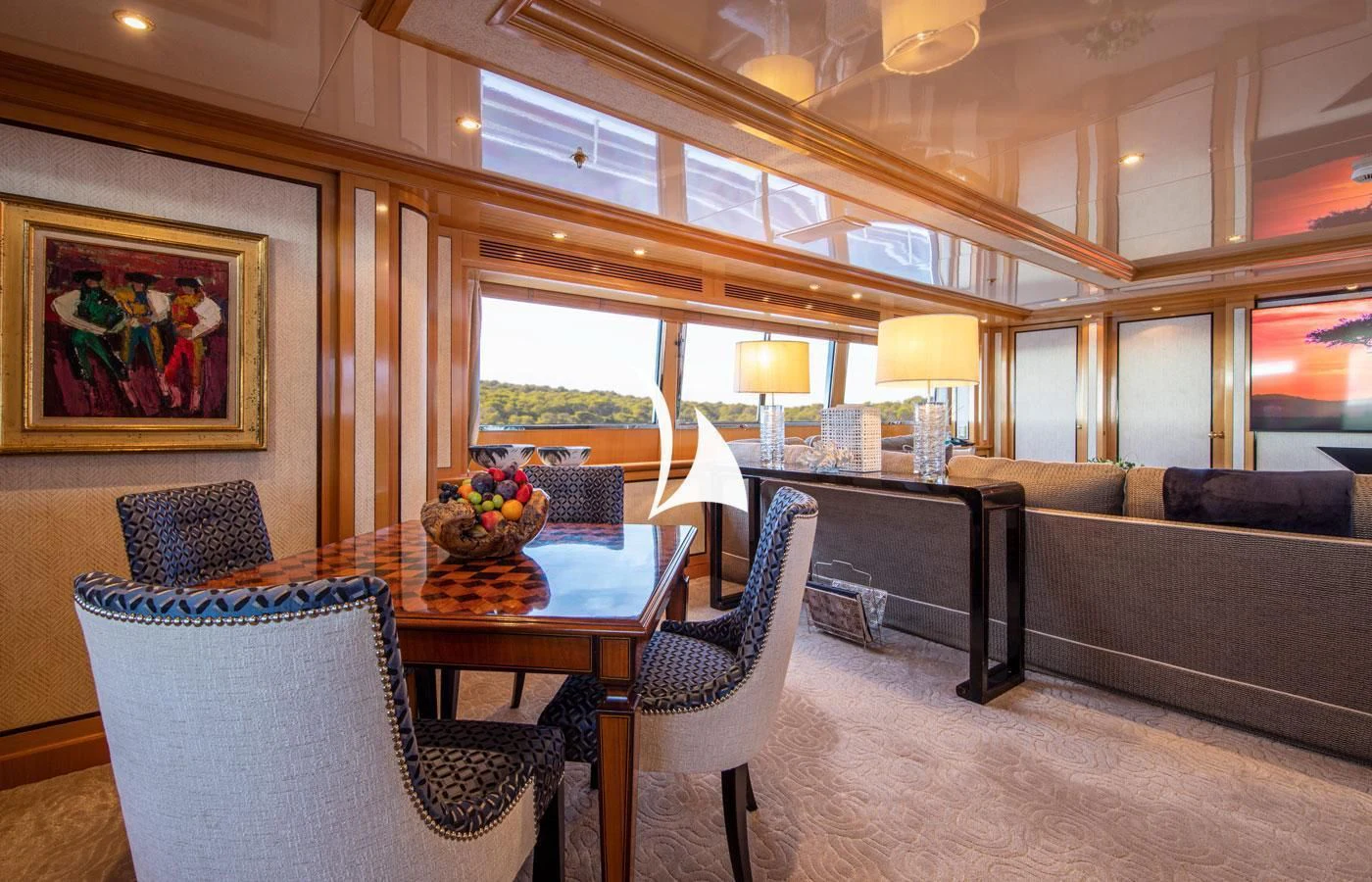 a living room with a couch and a table aboard EMERALD (YET) Yacht for Sale