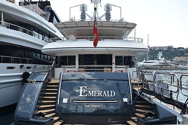 a boat docked at a pier aboard EMERALD (YET) Yacht for Sale