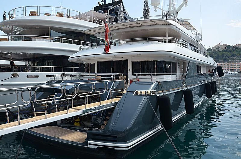 a boat docked at a pier aboard EMERALD (YET) Yacht for Sale