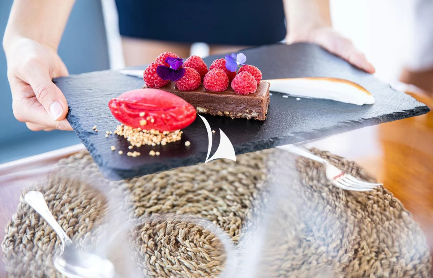 a cake on a plate aboard EMERALD (YET) Yacht for Sale