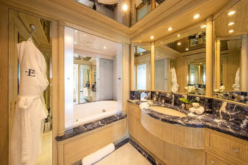 a bathroom with a large mirror aboard EMERALD (YET) Yacht for Sale