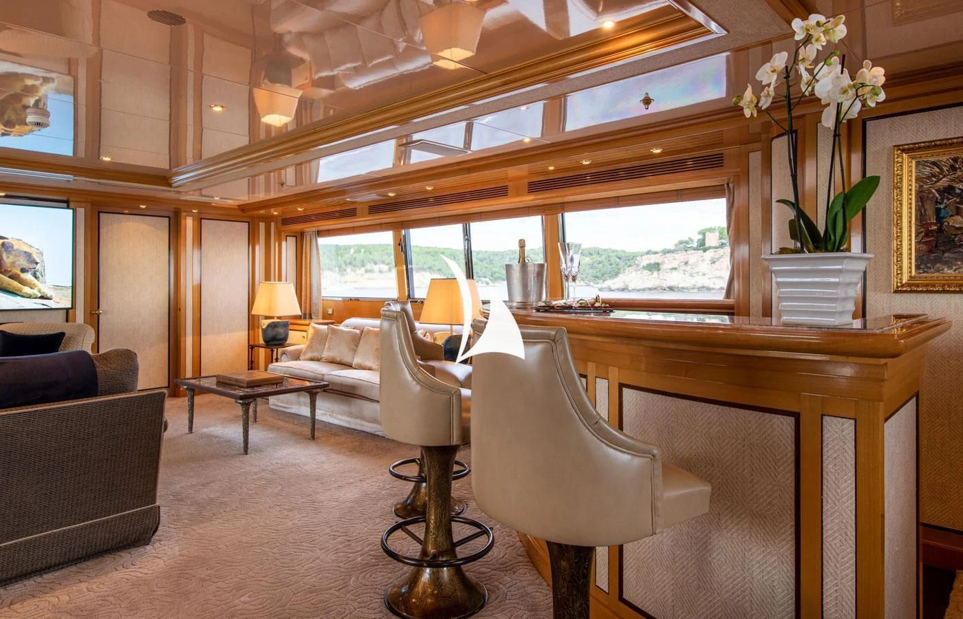 a living room with a couch and a table aboard EMERALD (YET) Yacht for Sale