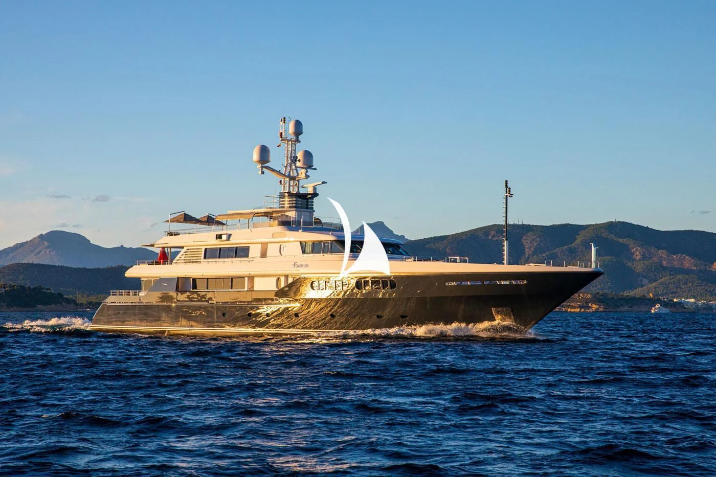 a large ship in the water aboard EMERALD (YET) Yacht for Sale
