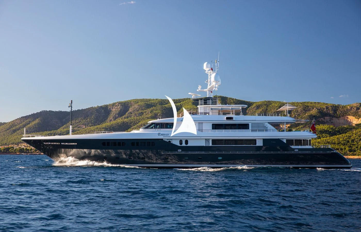 a large boat on the water aboard EMERALD (YET) Yacht for Sale