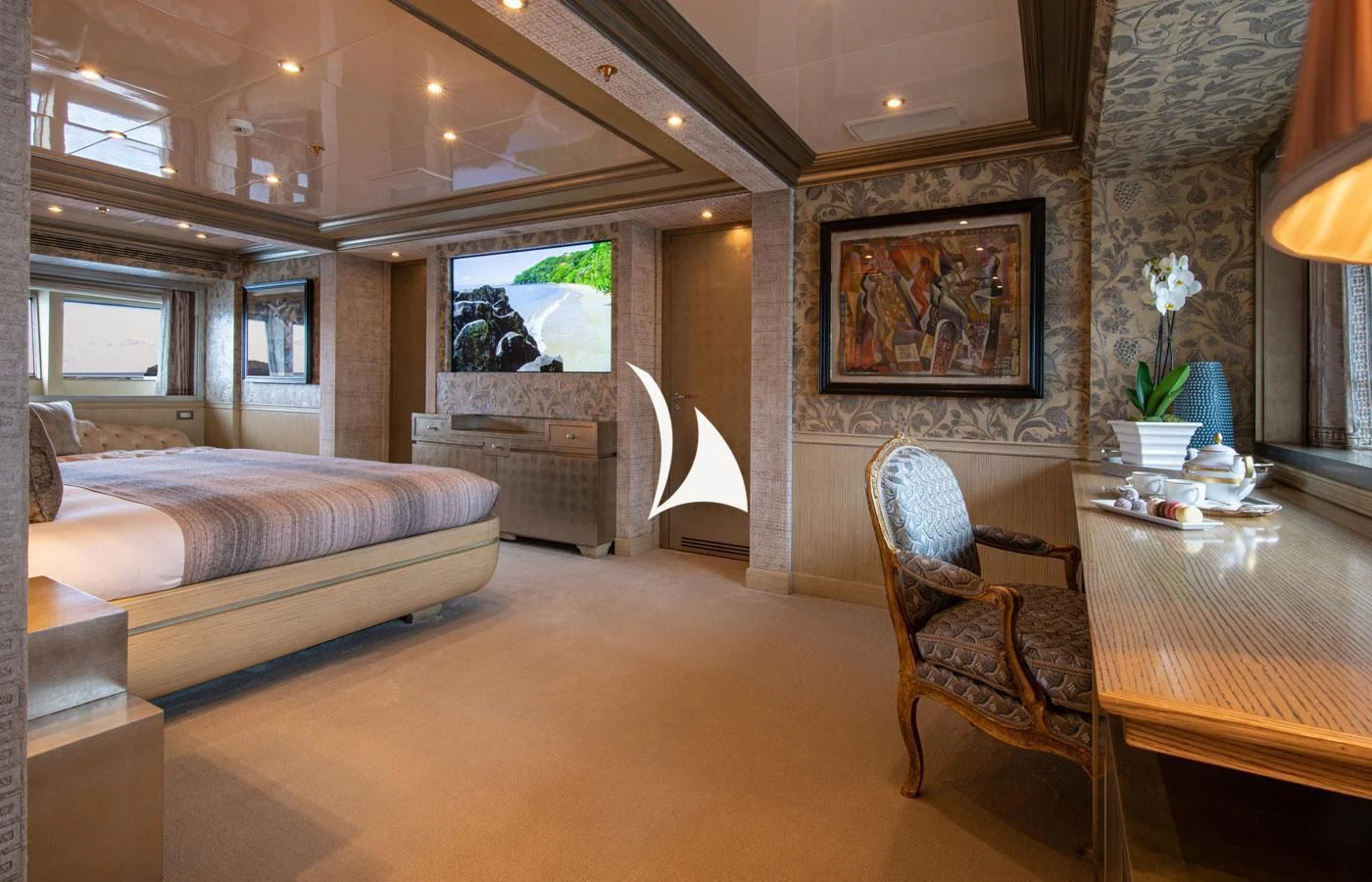 a room with a couch and a table and a chair aboard EMERALD (YET) Yacht for Sale