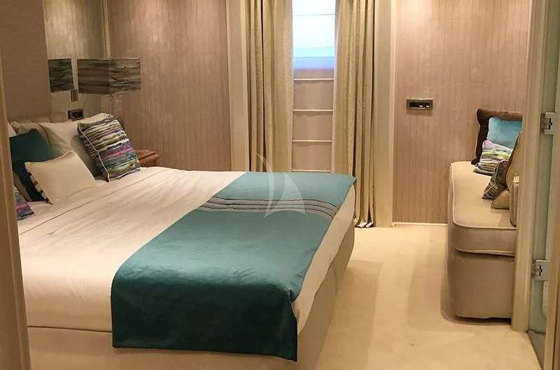 a bed in a room aboard ELEGANT 007 Yacht for Sale