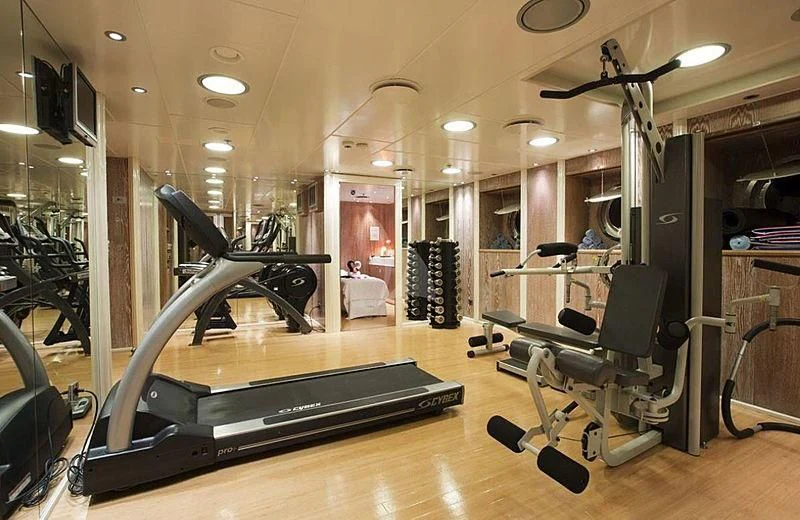 a gym with exercise equipment aboard ELEGANT 007 Yacht for Sale