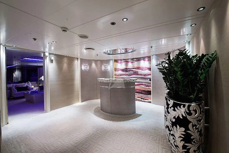 a large room with a plant in it aboard ELEGANT 007 Yacht for Sale