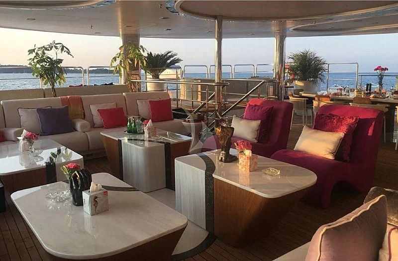 a room with a table and chairs aboard ELEGANT 007 Yacht for Sale