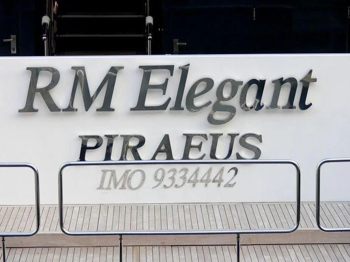 a sign on a metal railing aboard ELEGANT 007 Yacht for Sale