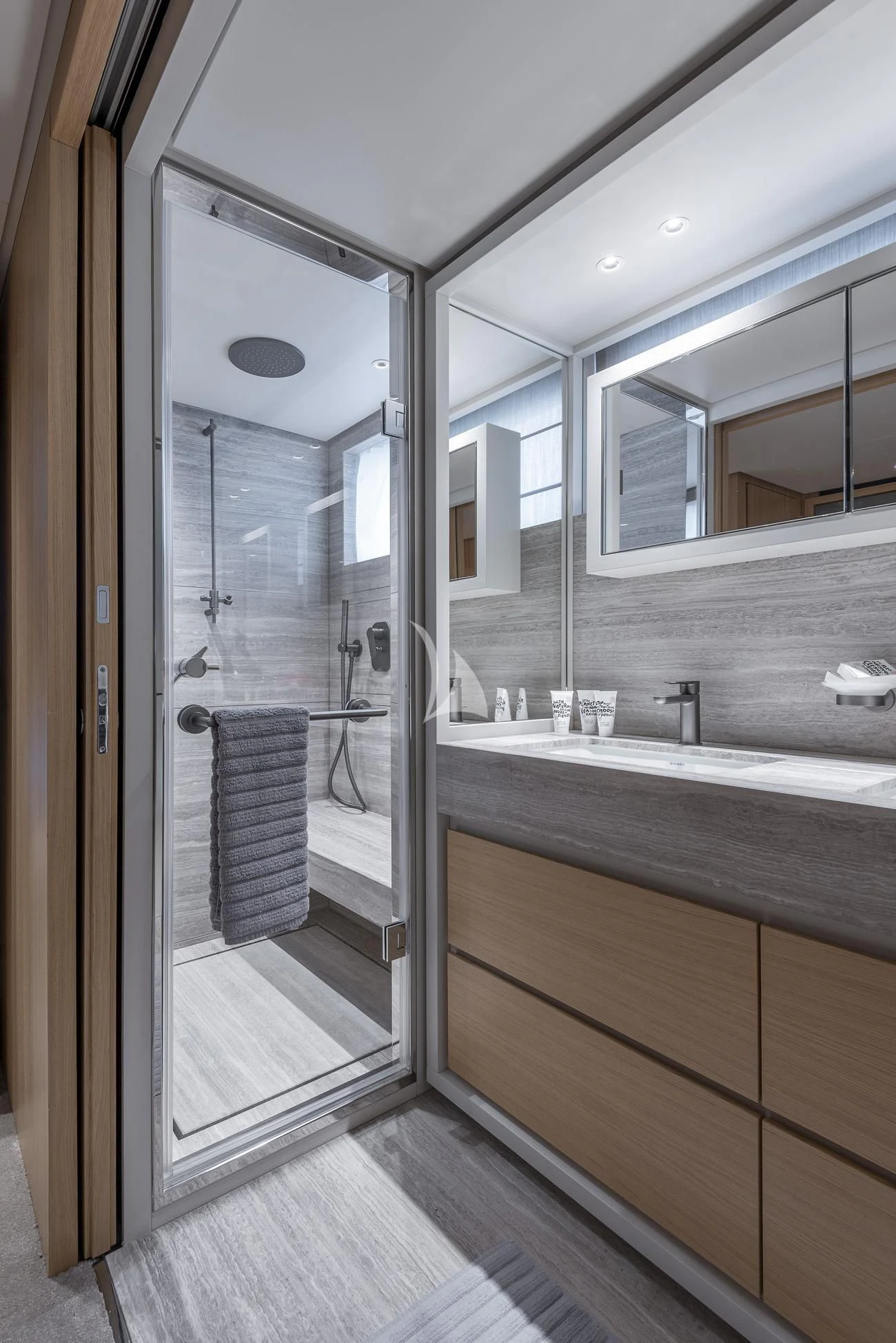 a bathroom with a glass shower aboard FATSA Yacht for Sale
